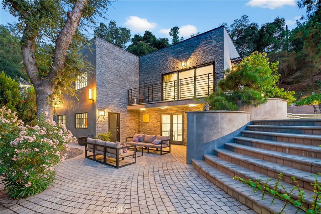 7580 McGroarty Terrace Los Angeles, CA 91042 - Photo 3 of 47 a view of a building with outdoor seating