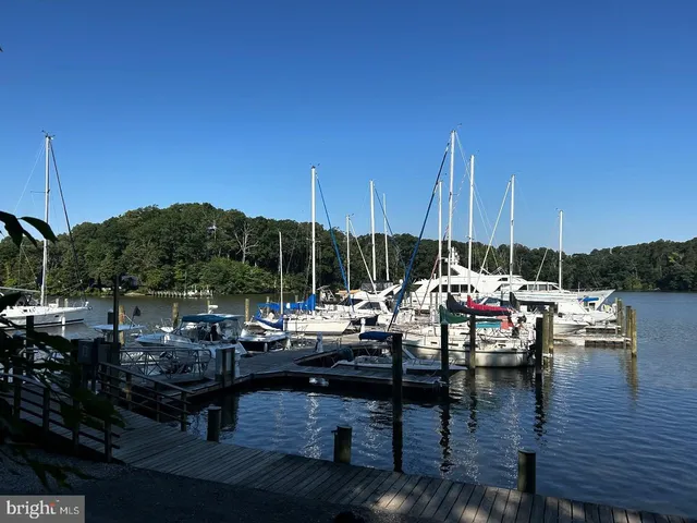 a view of deck with patio table and chairs