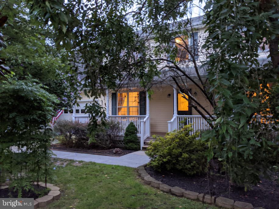 304 Goldenrod Road Winchester, VA 22602 - Photo 1 of 26 Beautiful Full Front Porch with Tree Garden View