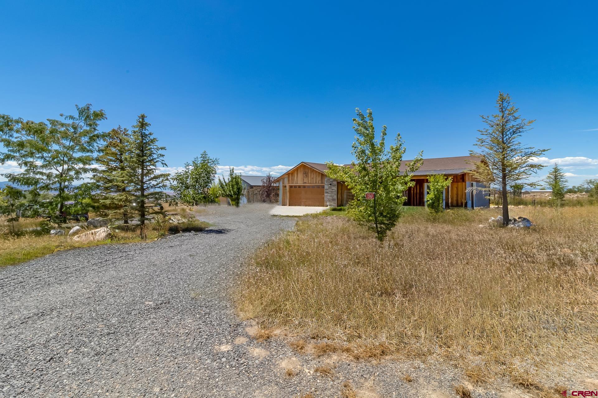 15969 Stardust Lane Cedaredge, CO 81413 - Photo 2 of 44 a view of two chairs