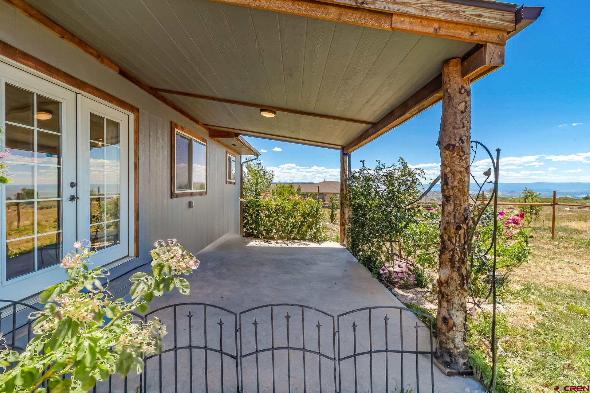 15969 Stardust Lane Cedaredge, CO 81413 - Photo 32 of 44 a view of a porch