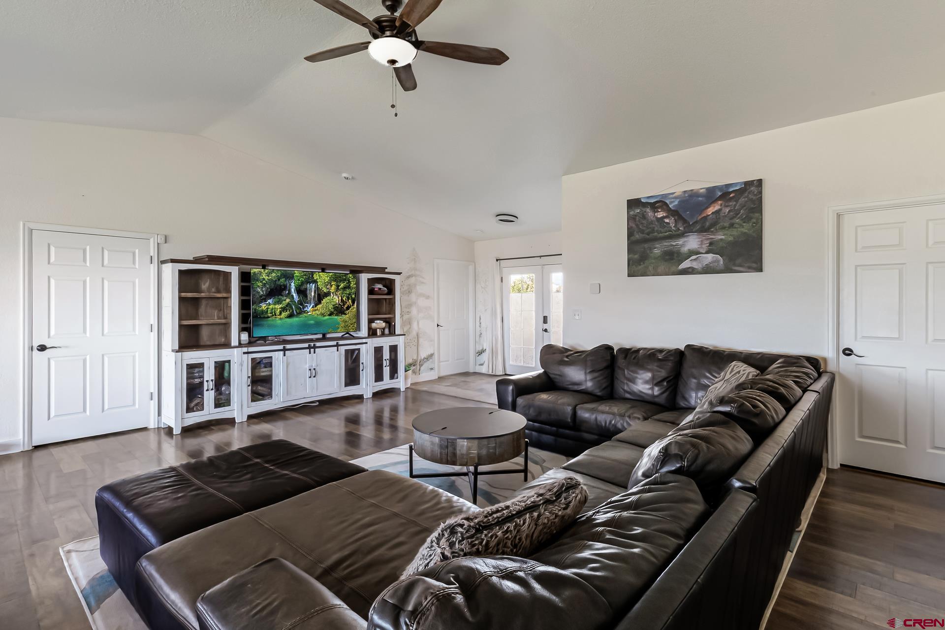 15969 Stardust Lane Cedaredge, CO 81413 - Photo 10 of 44 a living room with furniture and a window