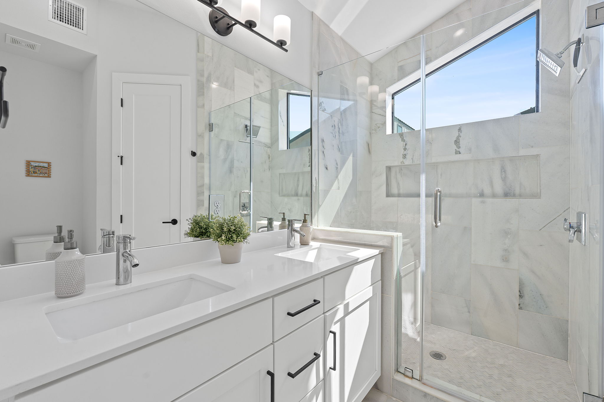 1168 Ridgeway Drive, Unit 2 Austin, TX 78702 - Photo 13 of 26 a bathroom with a sink and a mirror