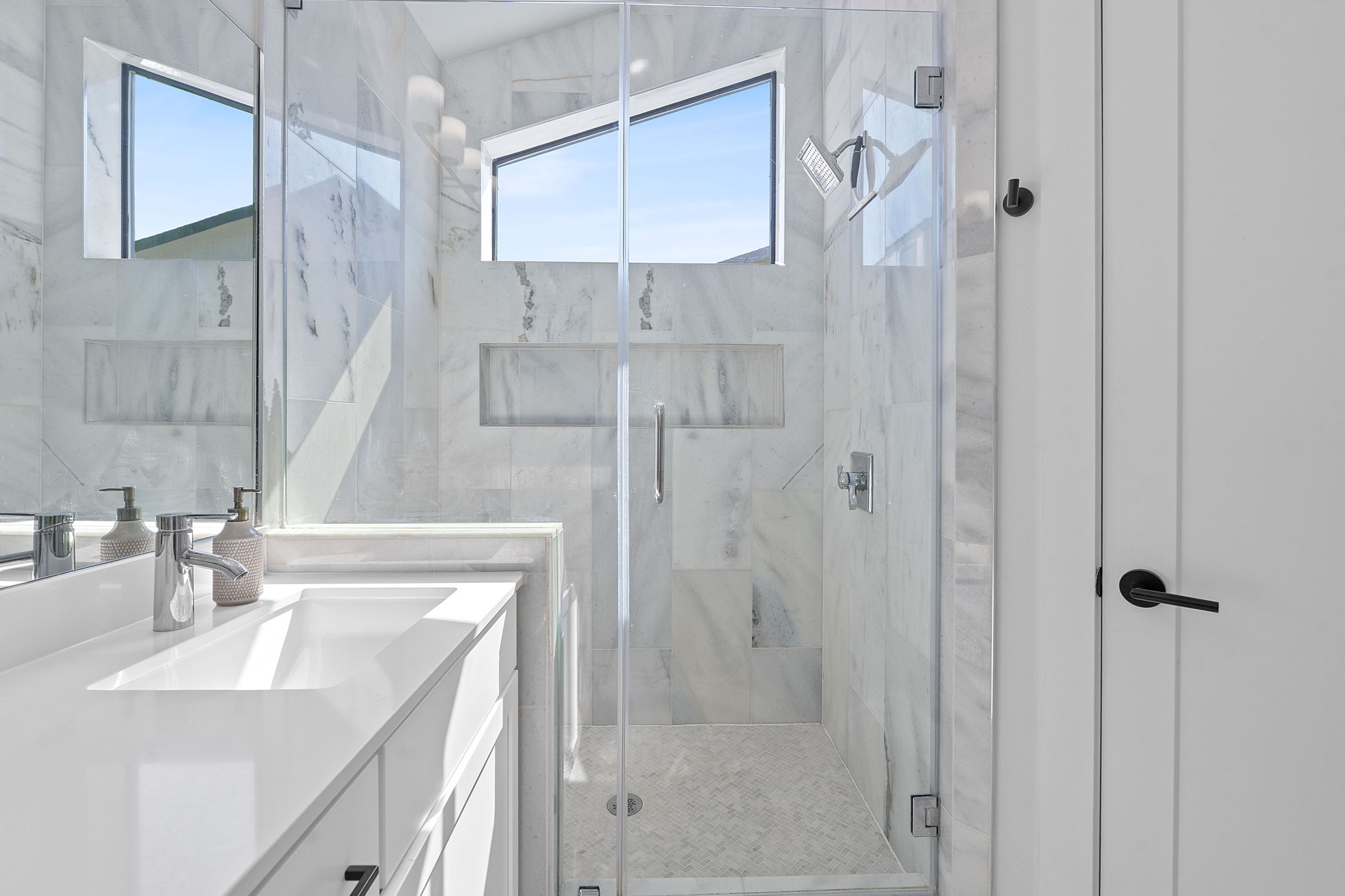 1168 Ridgeway Drive, Unit 2 Austin, TX 78702 - Photo 14 of 26 a bathroom with a sink vanity granite tub and shower