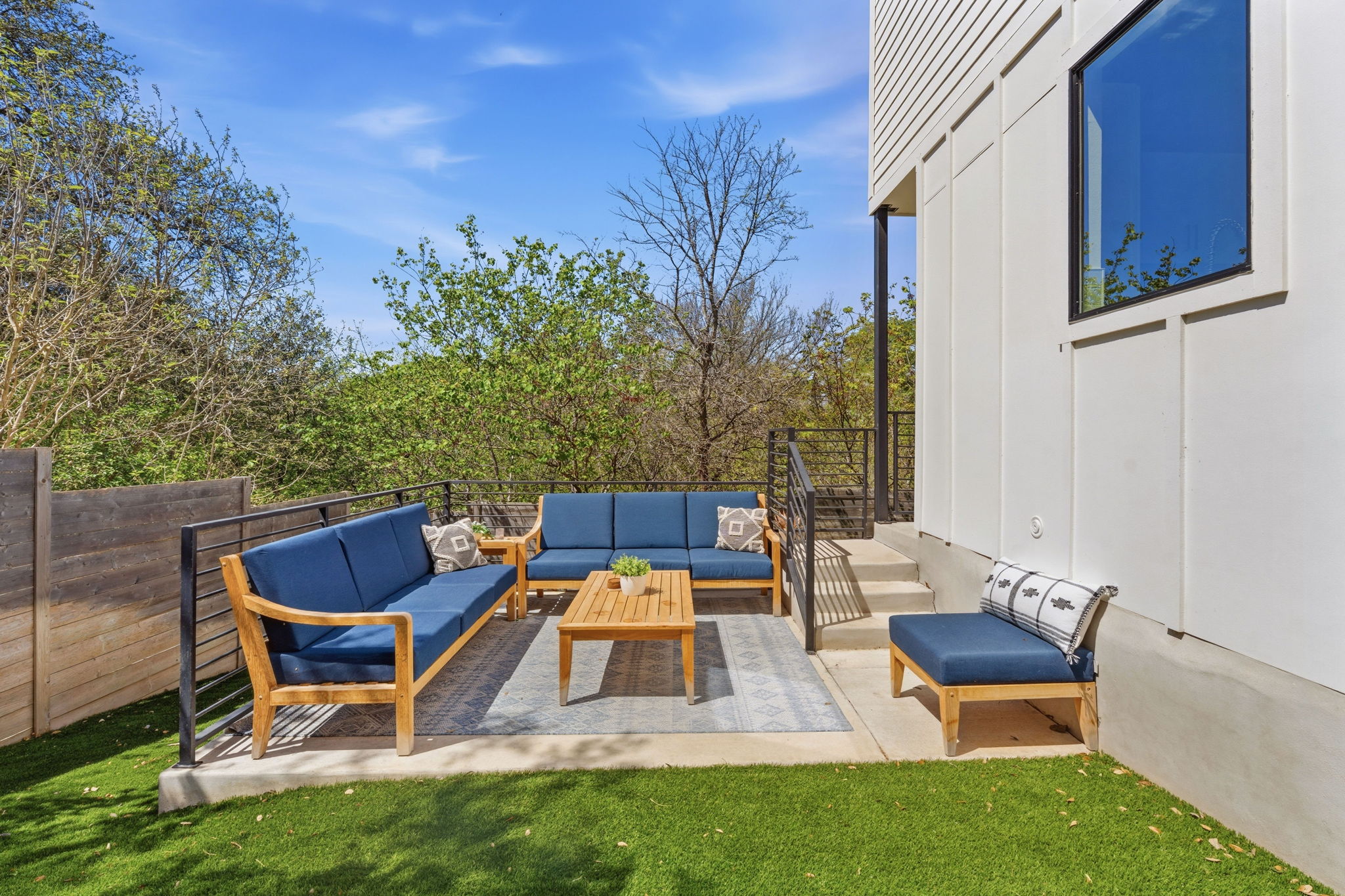 1168 Ridgeway Drive, Unit 2 Austin, TX 78702 - Photo 23 of 26 a wooden bench sitting in front of a house