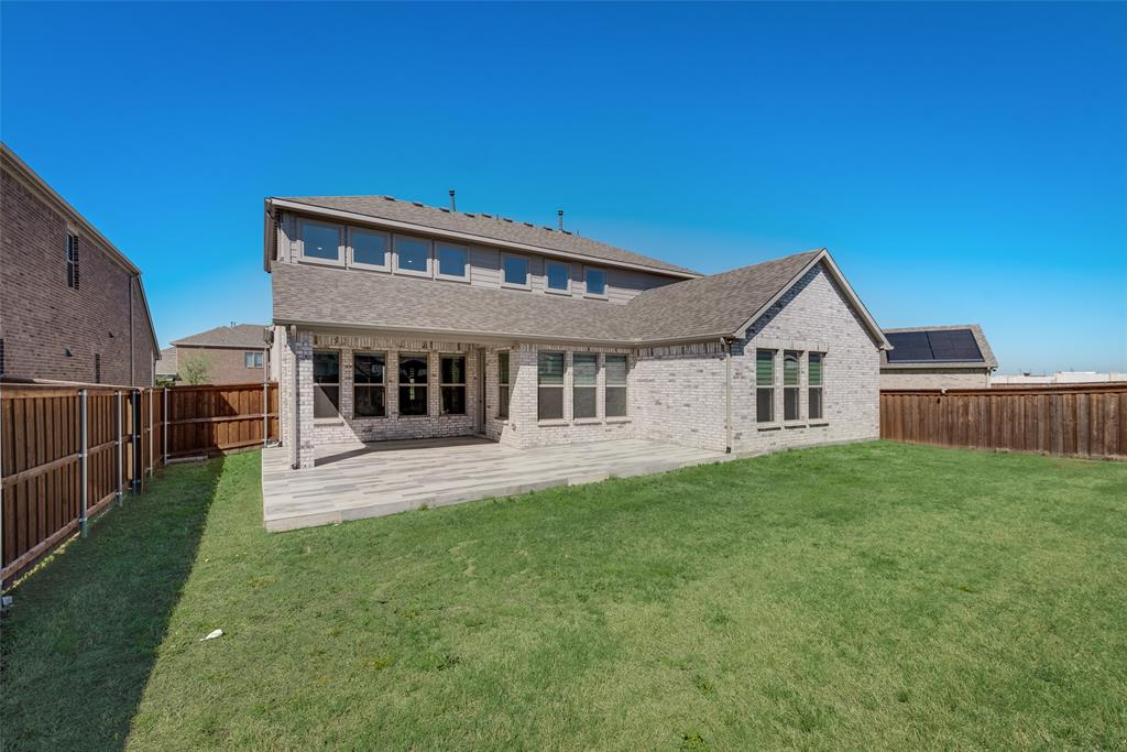 16476 Ryder Rock Road Frisco, TX 75033 - Photo 36 of 40 500 foot oversized custom back patio on flat backyard lot