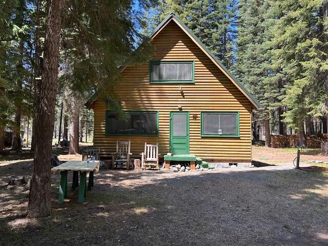 80 Diamond Lake Loop Chemult, OR 97731 - Photo 9 of 36 a view of a house with a yard