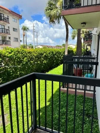 a view of a balcony with lake view