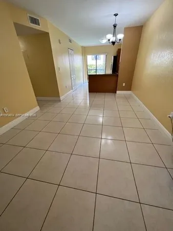 a view of a livingroom with wooden floor