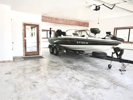 a bedroom with a bed and gym equipment