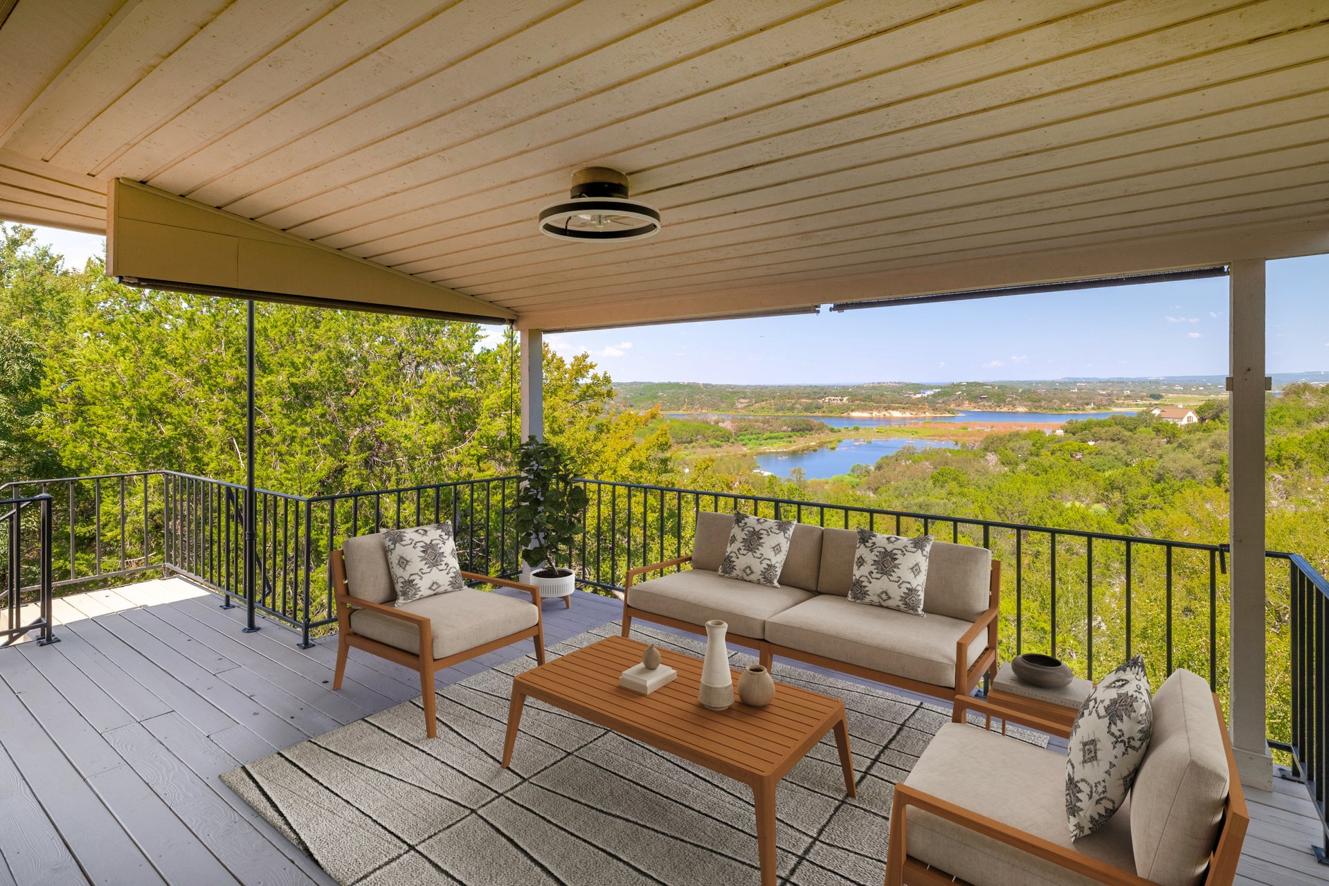 313 Kendall Road Spicewood, TX 78669 - Photo 26 of 34 a balcony with wooden floor and outdoor seating