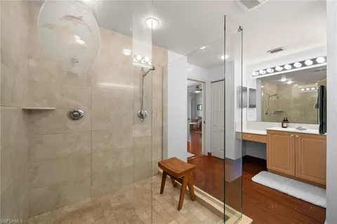 a bathroom with a sink and mirror