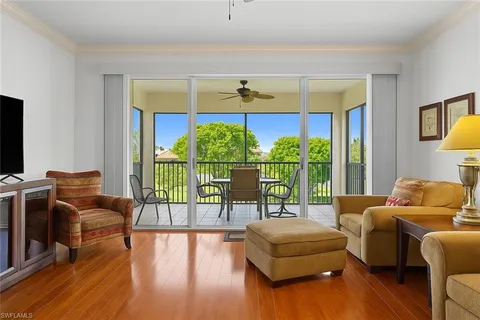 a view of a balcony with chairs