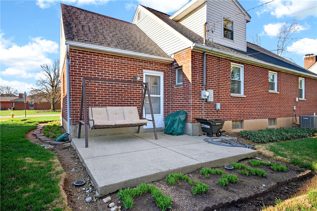 1237 Laurelwood Road Dayton, OH 45409 - Photo 42 of 56 This residence showcases a practical concrete patio, ideal for outdoor enjoyment and relaxation.