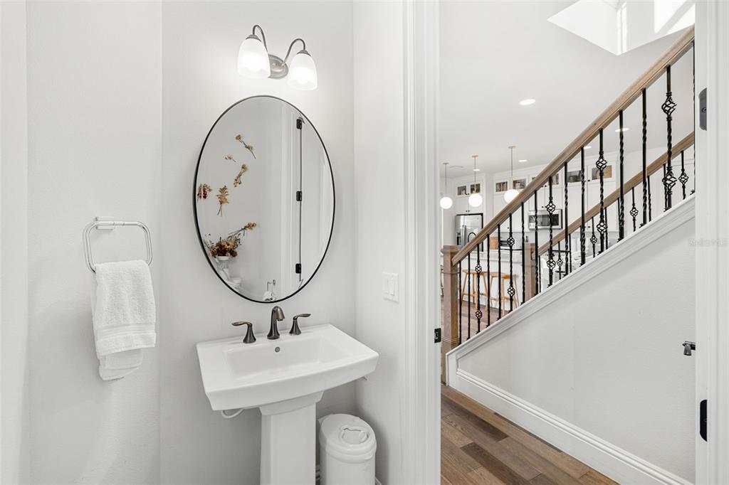 1732 Ridgewood Avenue, Unit S Maitland, FL 32751 - Photo 15 of 31 a bathroom with a sink and a mirror