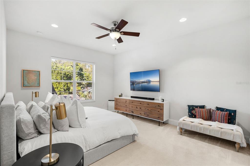 1732 Ridgewood Avenue, Unit S Maitland, FL 32751 - Photo 18 of 31 a living room with furniture and a flat screen tv