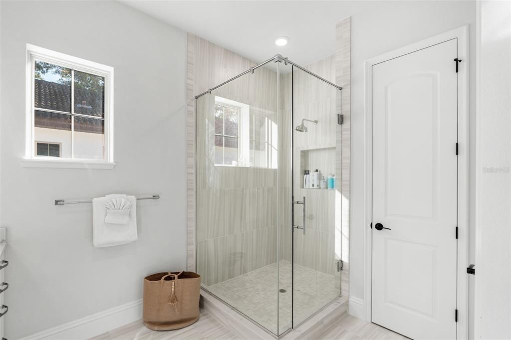 1732 Ridgewood Avenue, Unit S Maitland, FL 32751 - Photo 19 of 31 a bathroom with a shower and a sink