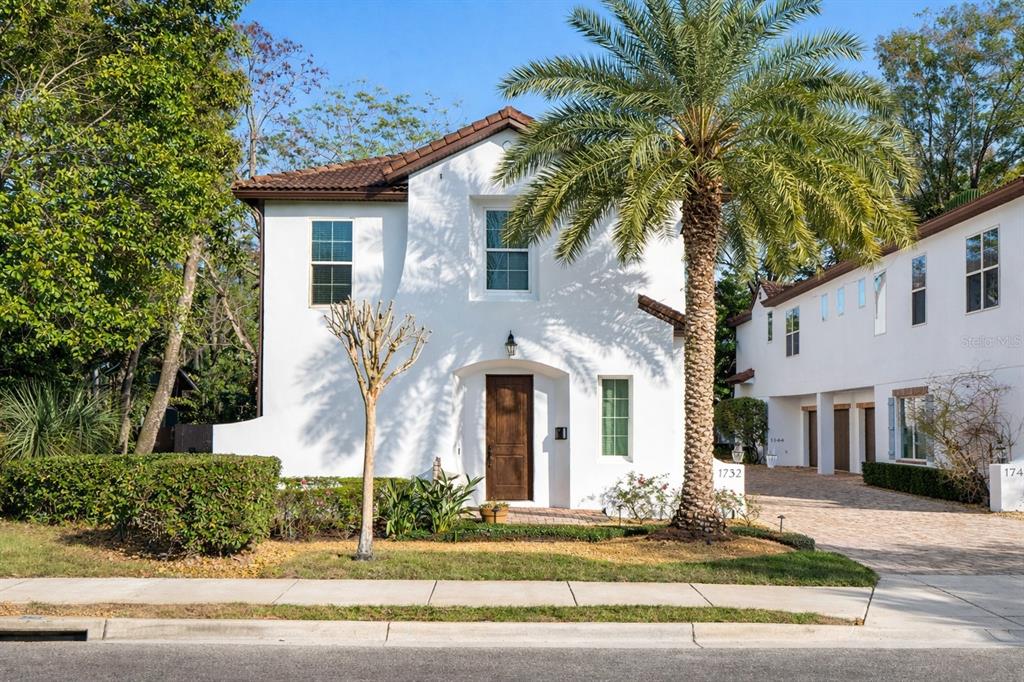 1732 Ridgewood Avenue, Unit S Maitland, FL 32751 - Photo 2 of 31 front view of a house with a yard