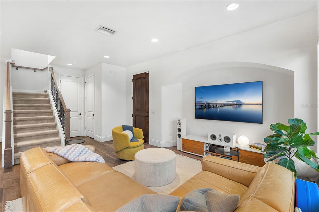 1732 Ridgewood Avenue, Unit S Maitland, FL 32751 - Photo 6 of 31 a living room with furniture and a flat screen tv