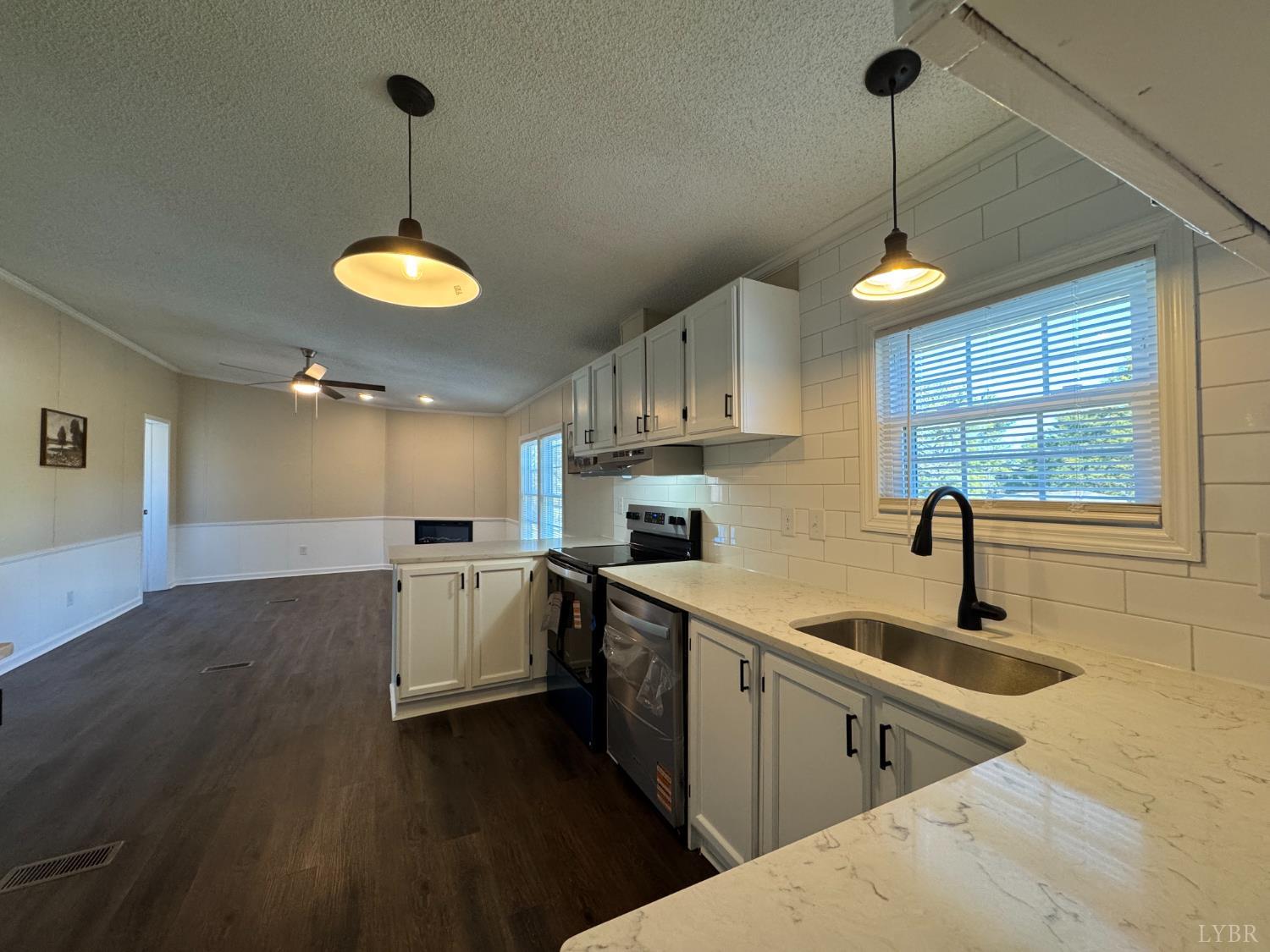5532 Watt Abbitt Road Appomattox, VA 24522 - Photo 15 of 26 a kitchen with stove and a sink