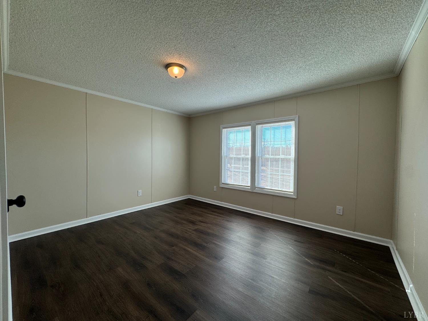5532 Watt Abbitt Road Appomattox, VA 24522 - Photo 9 of 26 an empty room with wooden floor and windows