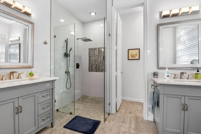 a living room with furniture a rug and a window