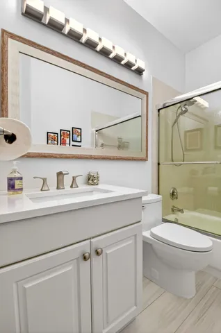 a front view of a house with a yard and porch