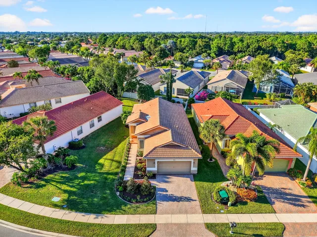 a view of living room with furniture and wooden floor
