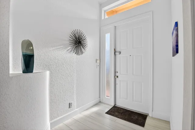 a view of livingroom with furniture and window