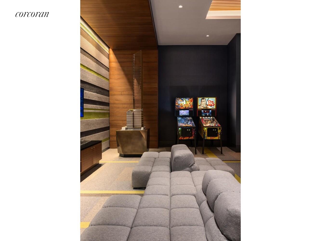 50 West 66th Street, Unit 4A Manhattan, NY 10023 - Photo 19 of 33 a view of a living room with a chair and dining table with wooden floor