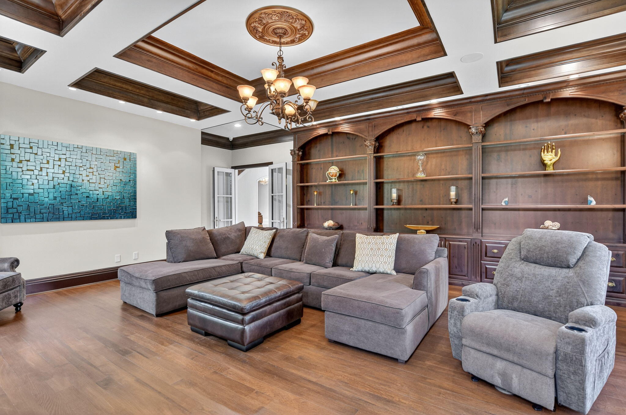 377 East Coconut Palm Road Boca Raton, FL 33432 - Photo 17 of 113 a living room with furniture and a chandelier