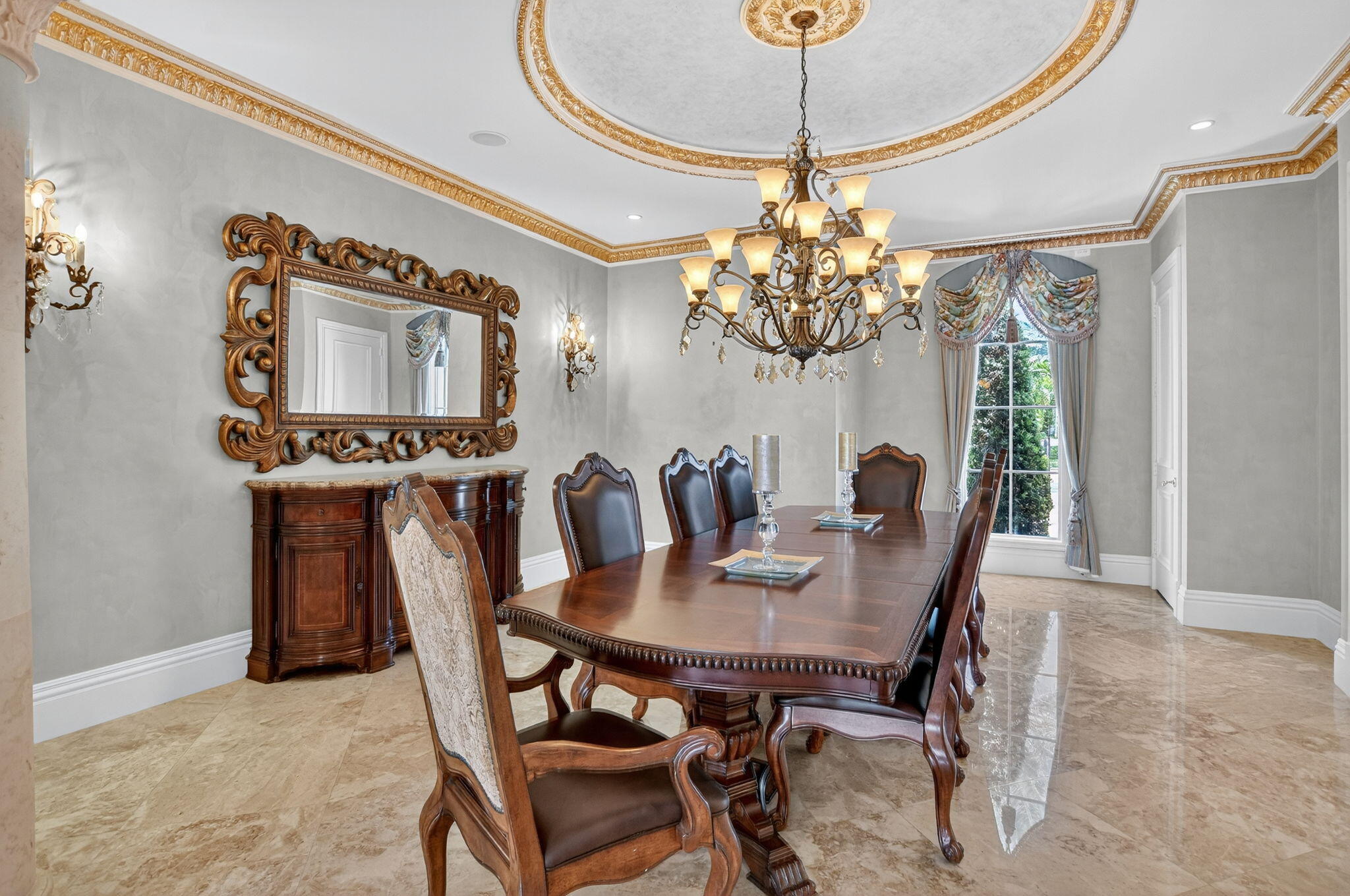 377 East Coconut Palm Road Boca Raton, FL 33432 - Photo 28 of 113 a view of a dining room with furniture and chandelier