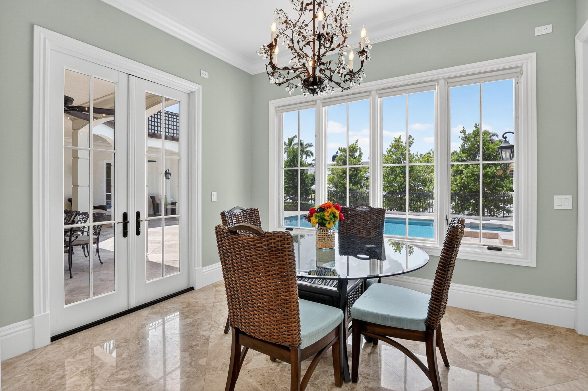 377 East Coconut Palm Road Boca Raton, FL 33432 - Photo 40 of 113 a view of a dining room with furniture window and outside view