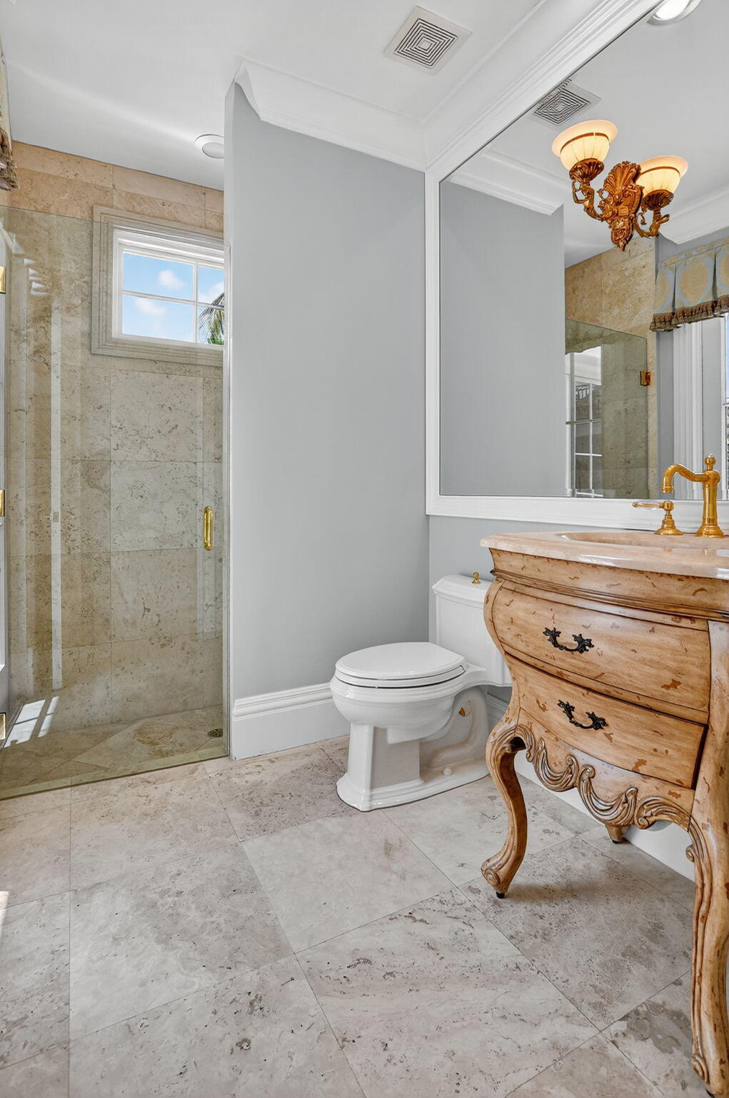 377 East Coconut Palm Road Boca Raton, FL 33432 - Photo 43 of 113 a bathroom with a granite countertop toilet a sink and a shower