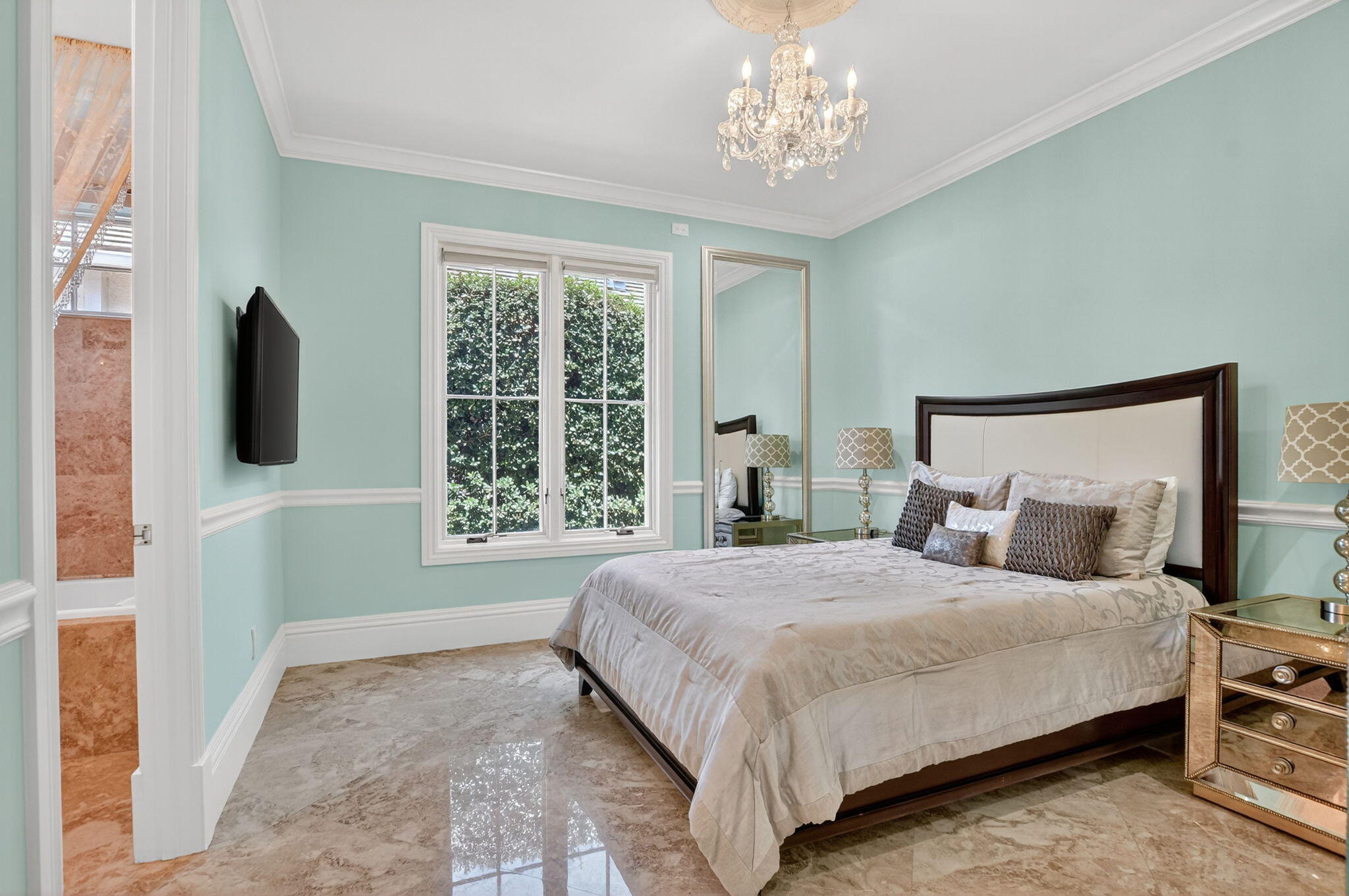 377 East Coconut Palm Road Boca Raton, FL 33432 - Photo 44 of 113 a bedroom with a large bed and a flat tv screen on a dresser