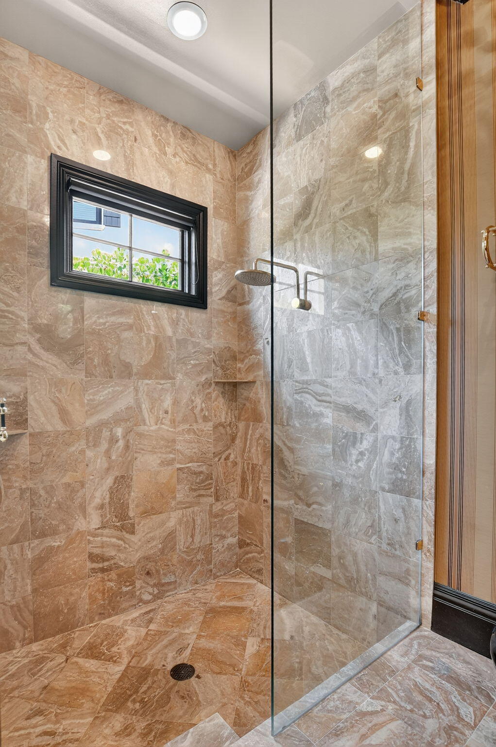 377 East Coconut Palm Road Boca Raton, FL 33432 - Photo 56 of 113 a bathroom with a shower and a mirror