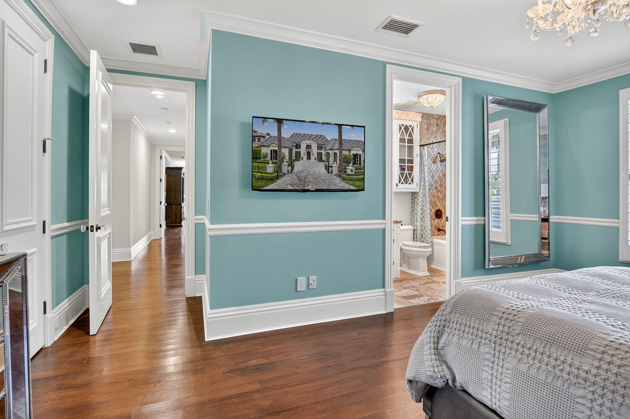 377 East Coconut Palm Road Boca Raton, FL 33432 - Photo 70 of 113 a bedroom with a bed and a painting on the wall