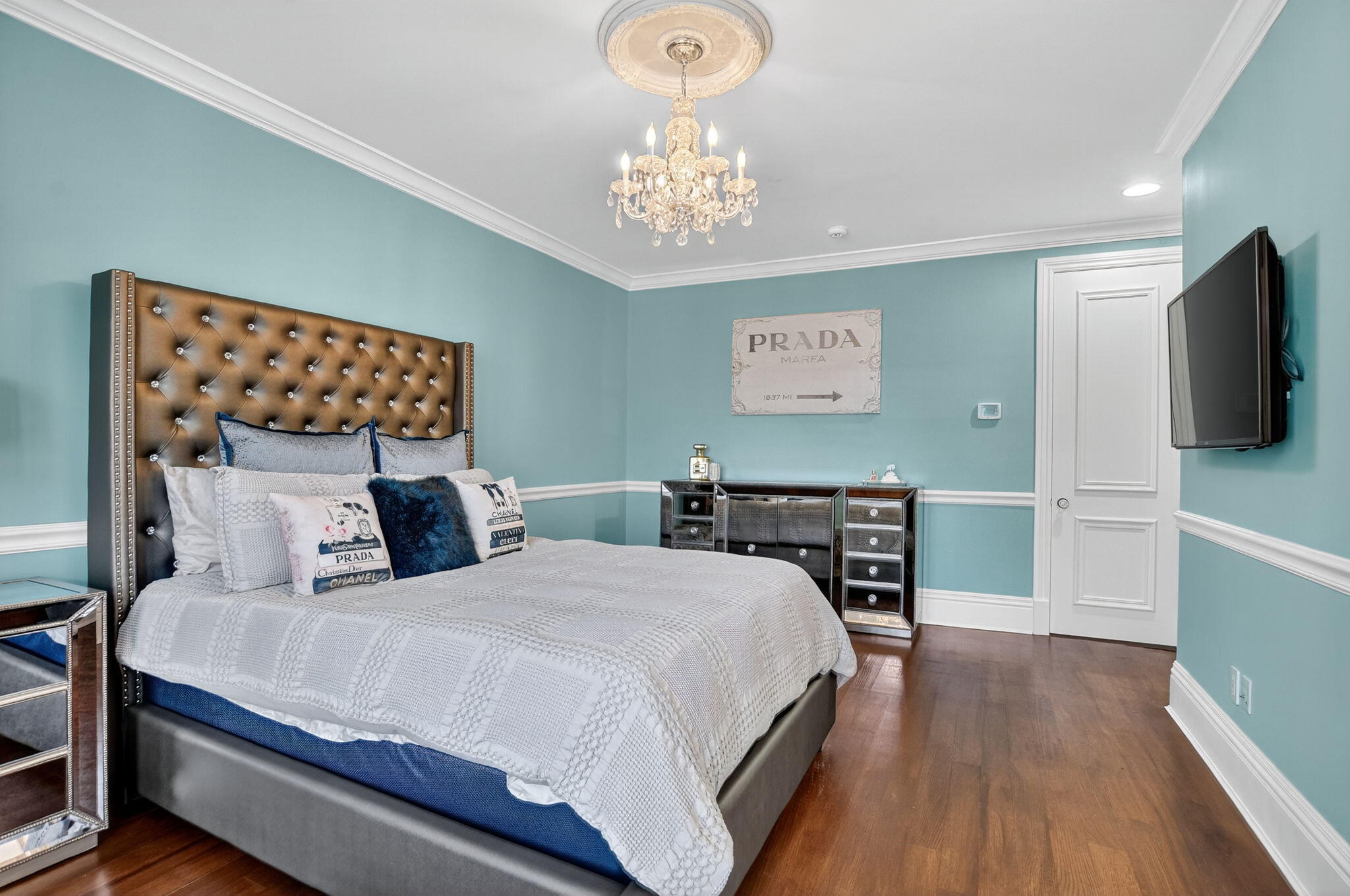 377 East Coconut Palm Road Boca Raton, FL 33432 - Photo 71 of 113 a bedroom with a bed and a flat screen tv