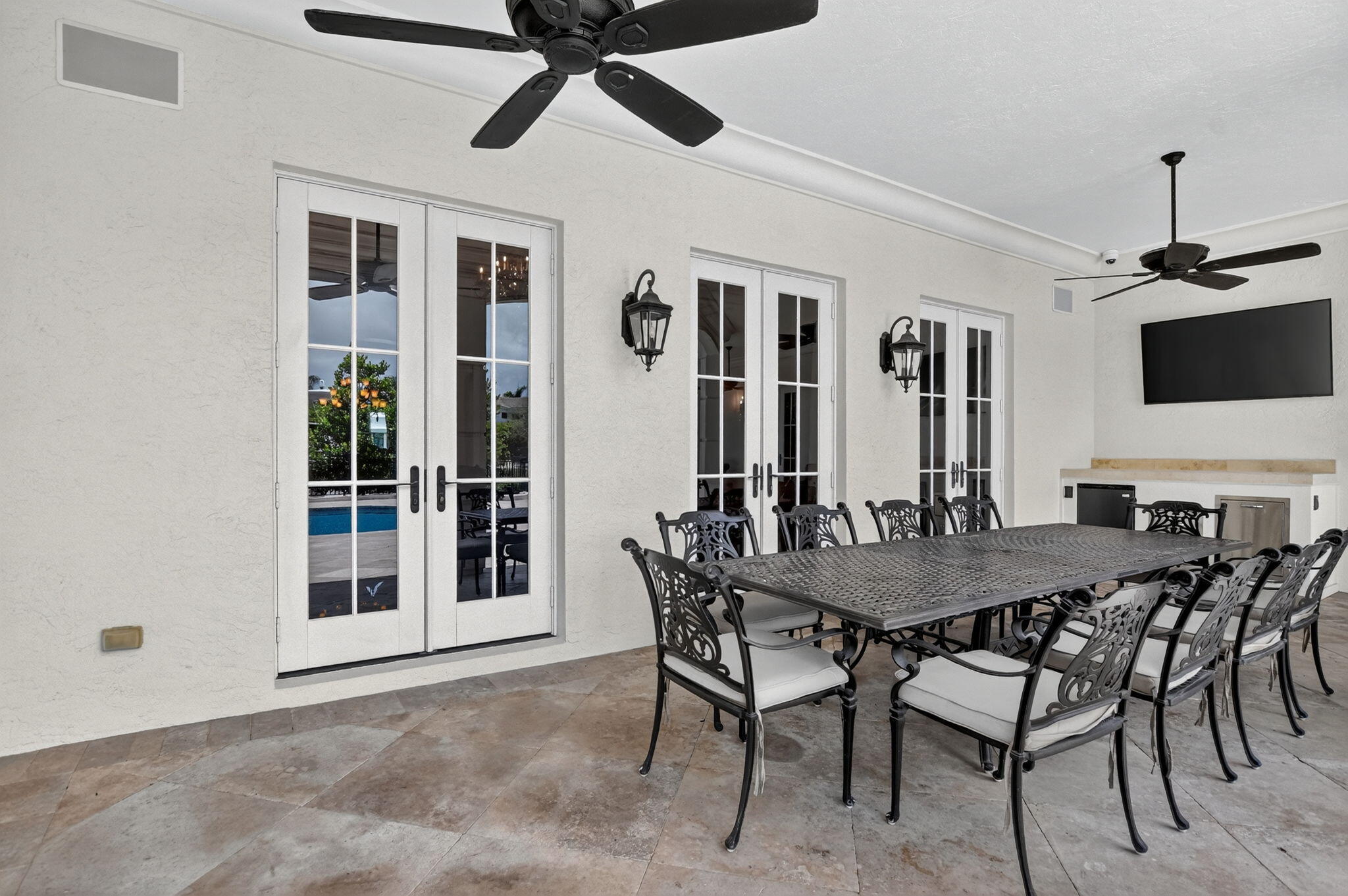 377 East Coconut Palm Road Boca Raton, FL 33432 - Photo 75 of 113 a view of a dining room with furniture and a floor to ceiling window