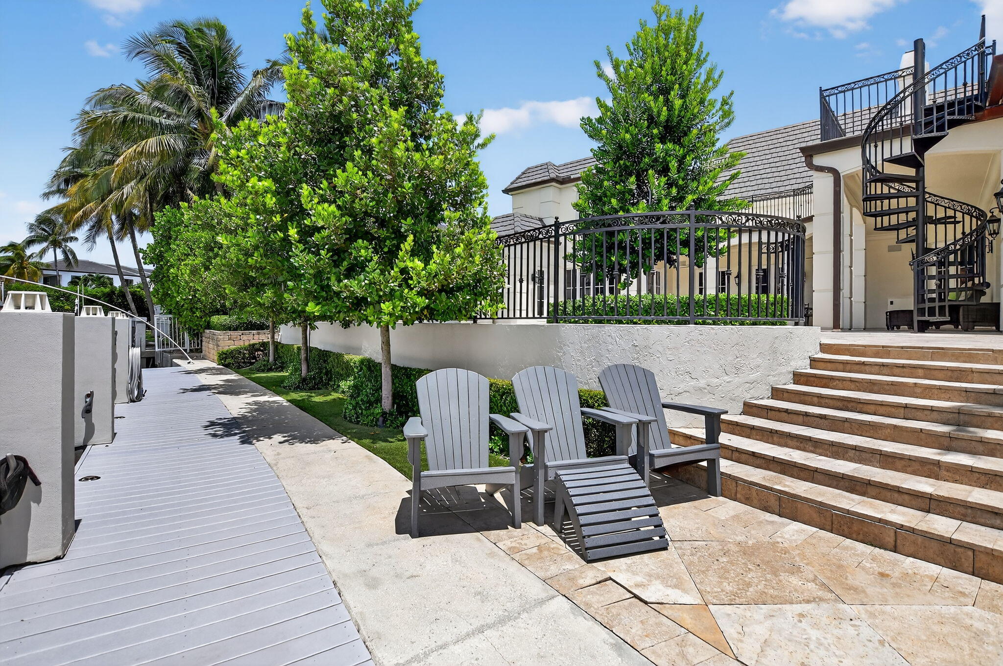377 East Coconut Palm Road Boca Raton, FL 33432 - Photo 90 of 113 a view of a patio with two chairs and a table