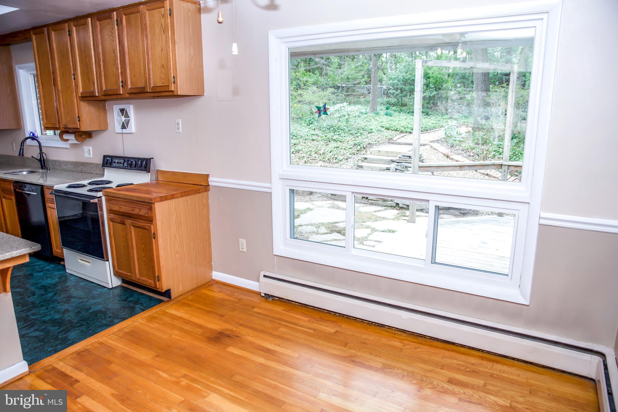 122 Northway Road Greenbelt, MD 20770 - Photo 14 of 68 Picture window for wooded views while dining.