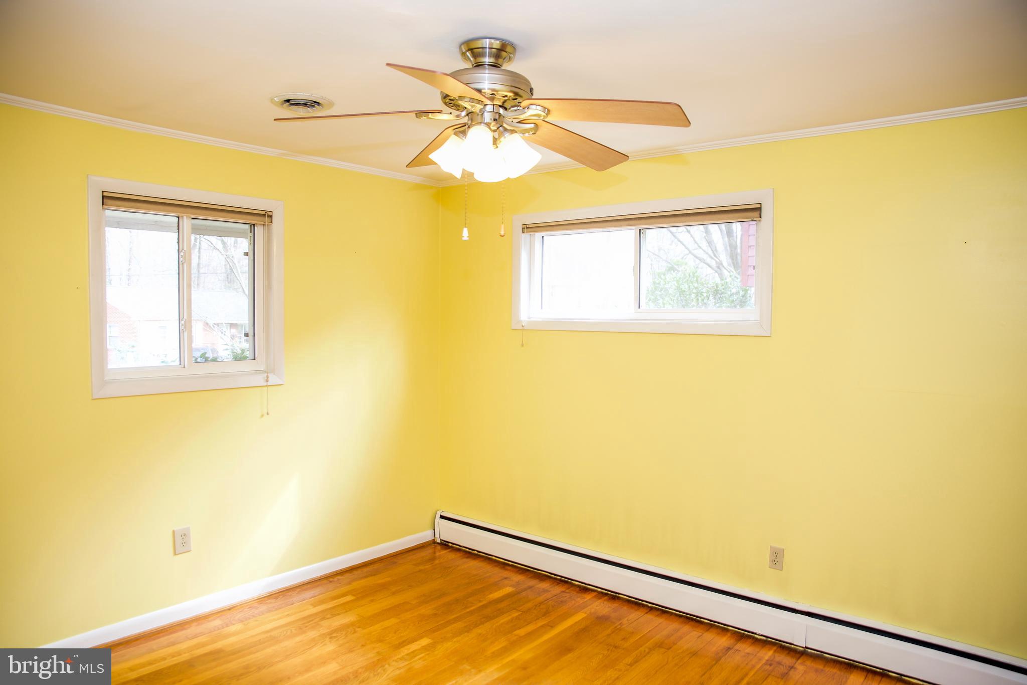 122 Northway Road Greenbelt, MD 20770 - Photo 22 of 68 Master bedroom with ceiling fan