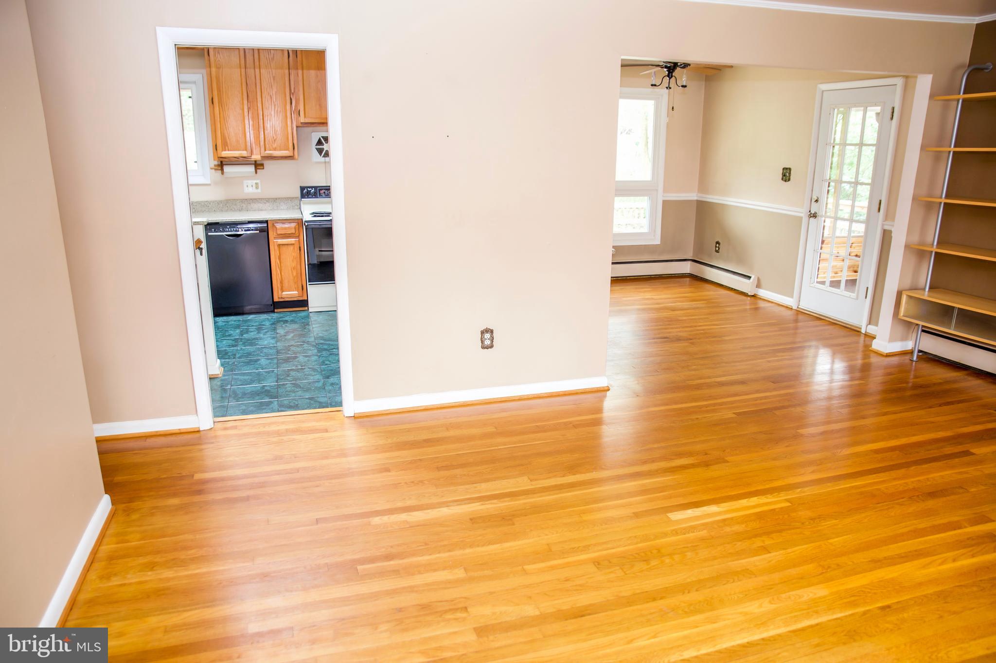 122 Northway Road Greenbelt, MD 20770 - Photo 8 of 68 Open flow from living room to kitchen to dining