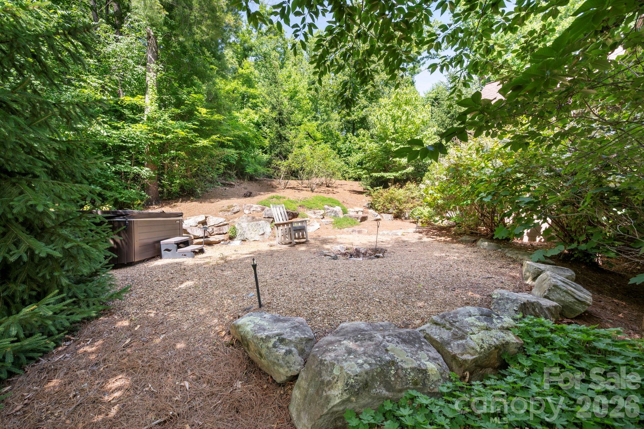 235 Bull Creek Road Asheville, NC 28805 - Photo 43 of 47 a view of a forest with trees