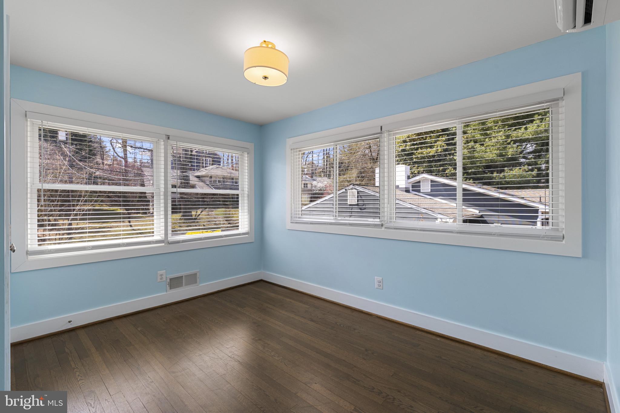 1519 Winchester Road Annapolis, MD 21409 - Photo 14 of 34 a view of an empty room with wooden floor and a window