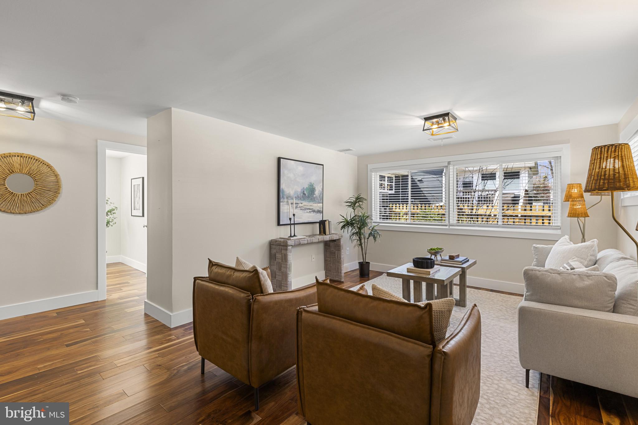 1519 Winchester Road Annapolis, MD 21409 - Photo 17 of 34 a living room with furniture and a wooden floor