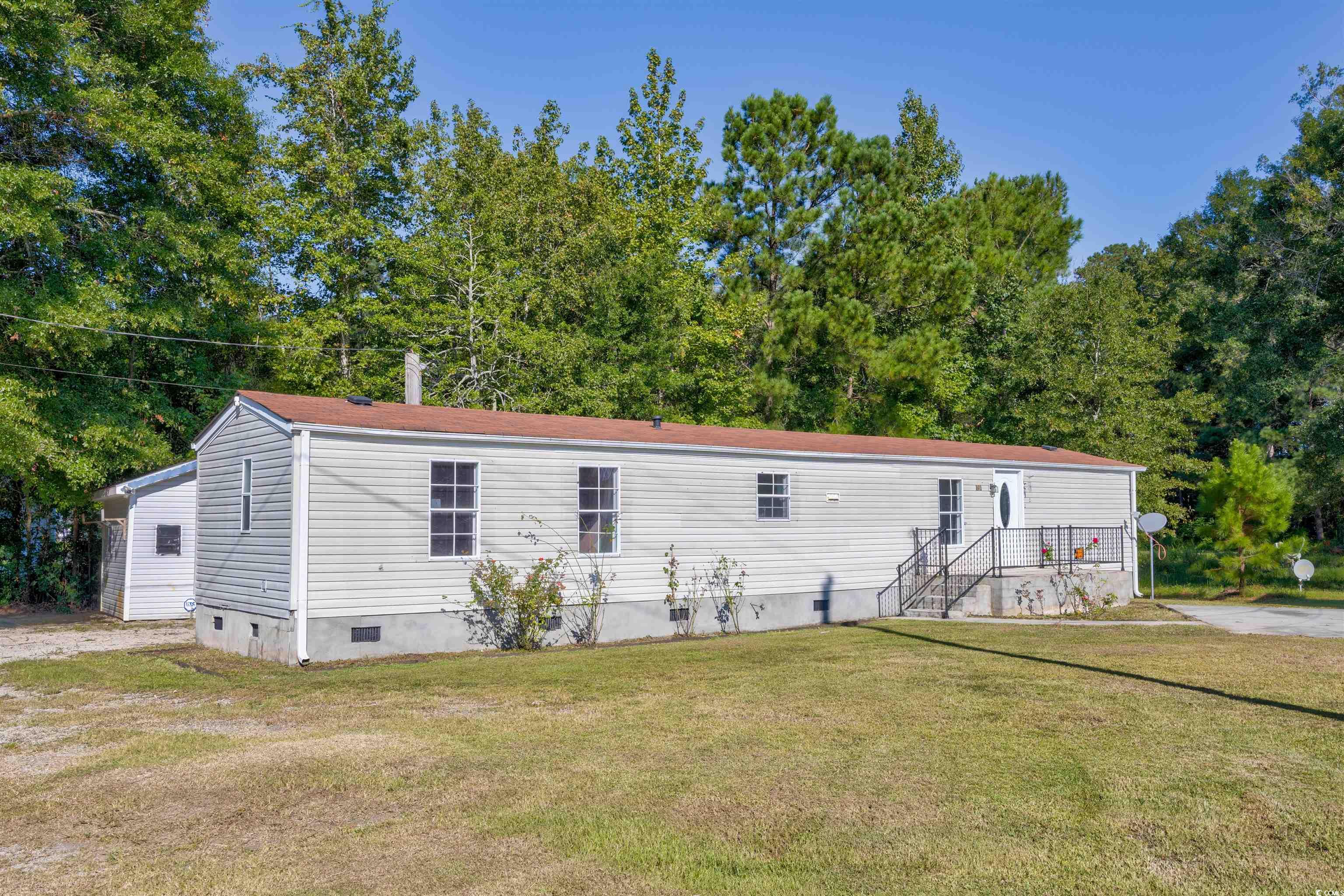 193 Nollie Road Myrtle Beach, SC 29588 - Photo 1 of 35 Manufactured / mobile home featuring crawl space and a front lawn