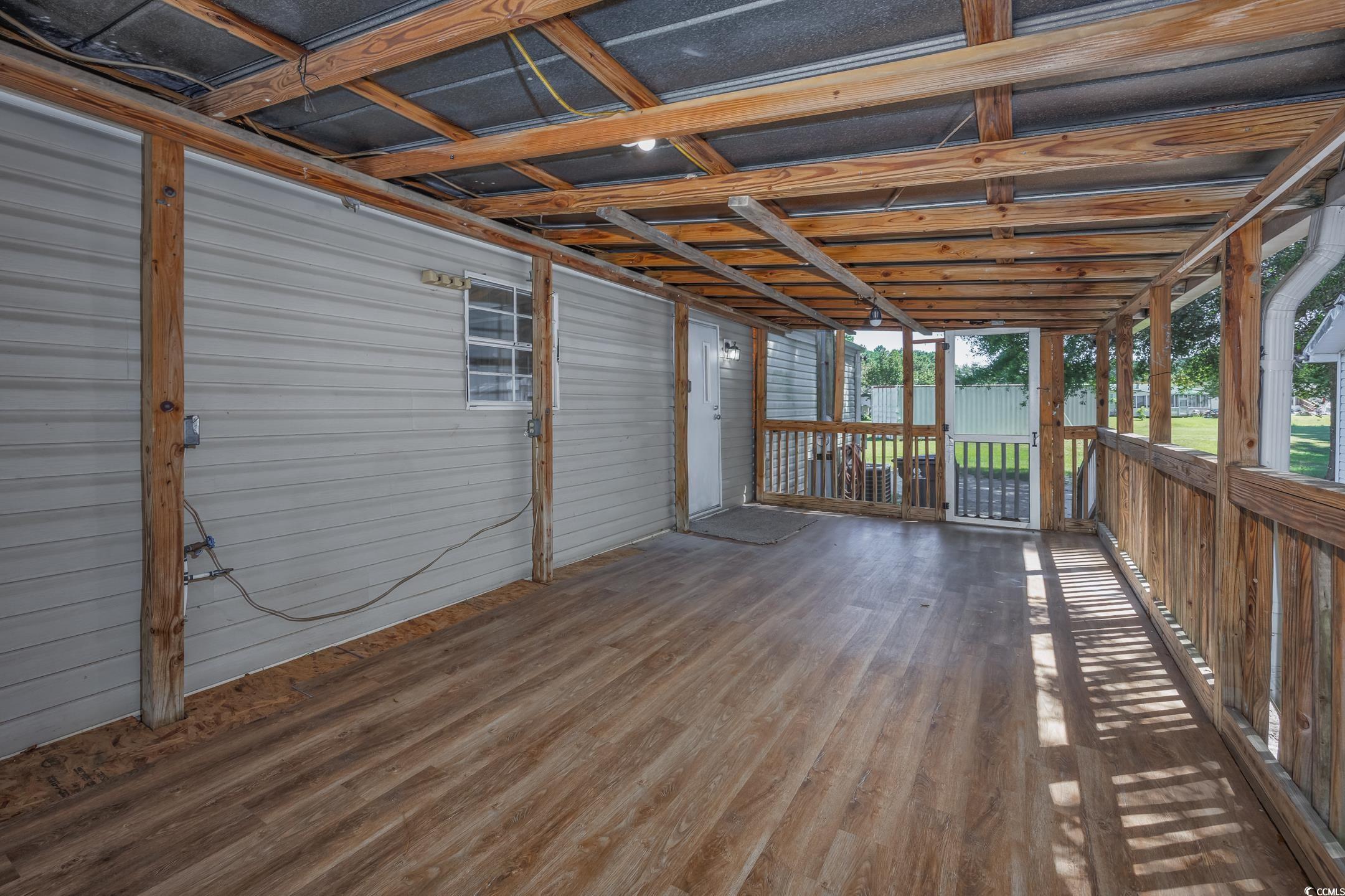 193 Nollie Road Myrtle Beach, SC 29588 - Photo 14 of 35 View of wooden deck