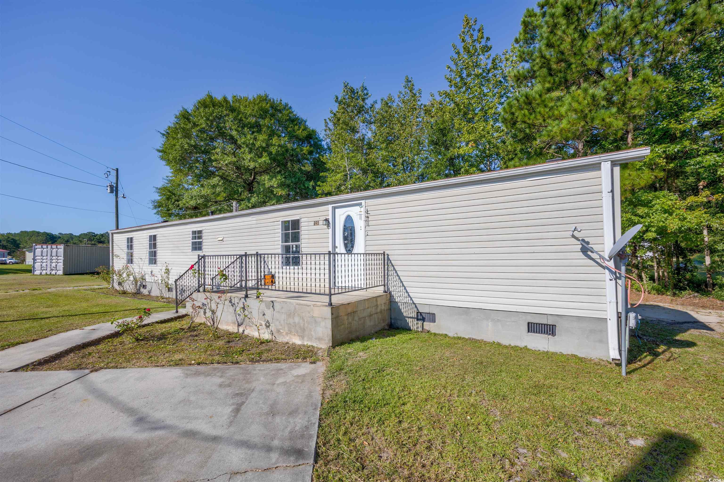 193 Nollie Road Myrtle Beach, SC 29588 - Photo 2 of 35 Manufactured / mobile home with crawl space and a front lawn