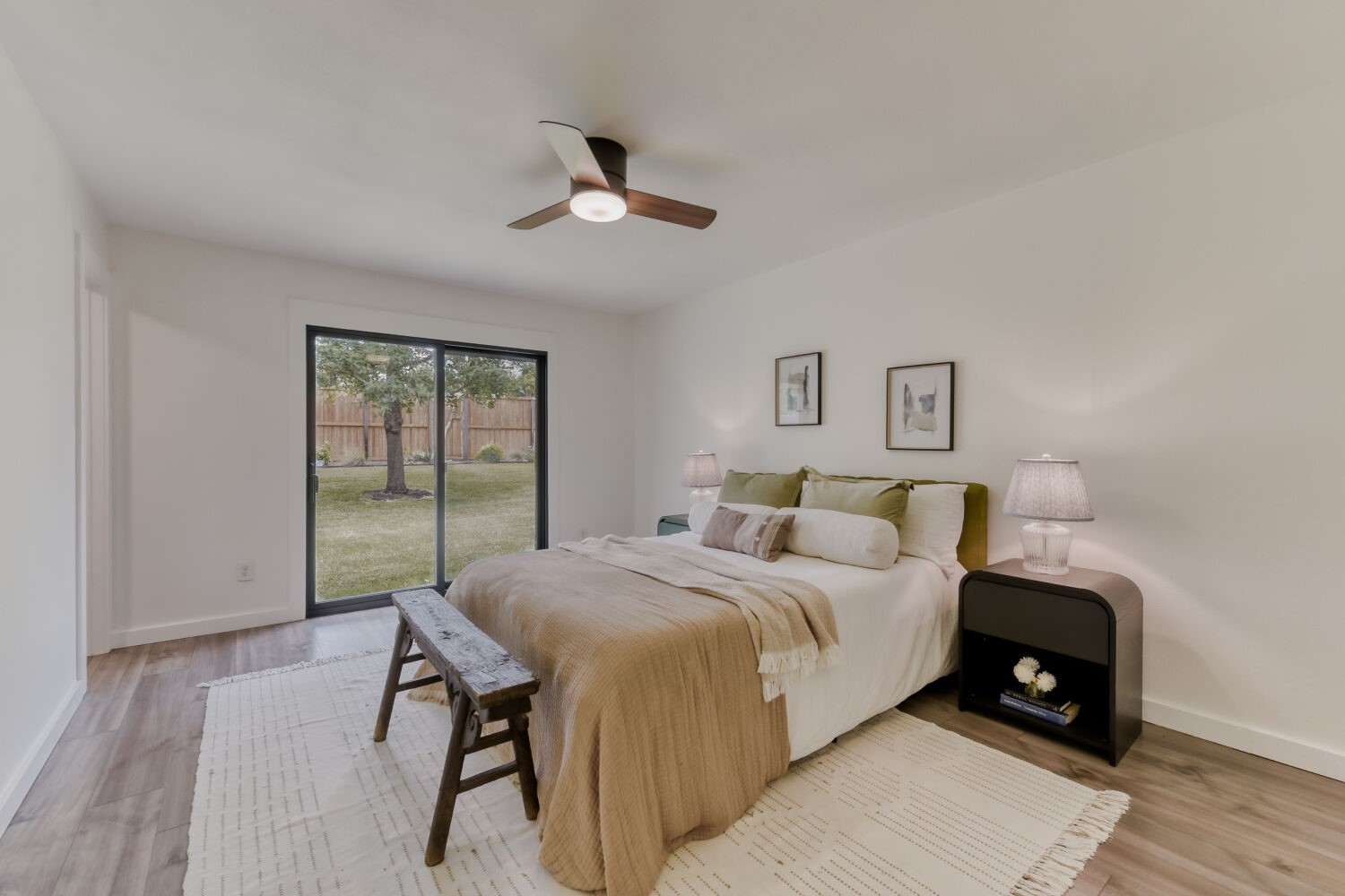 6108 Bridlington Circle Austin, TX 78745 - Photo 11 of 22 a bedroom with a bed and a table